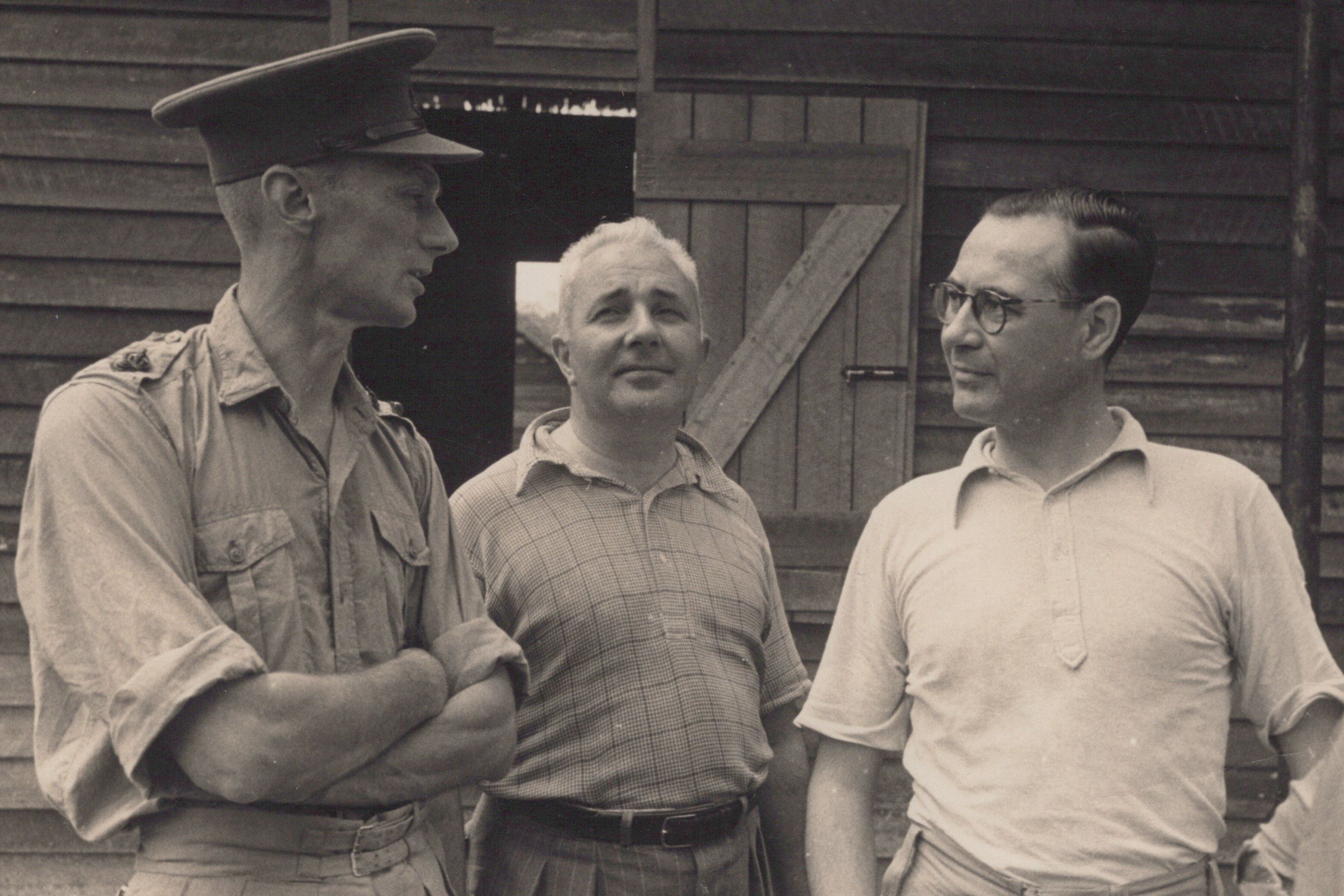 Cotter Harvey speaking to reporters on liberation in 1945